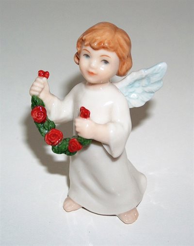 Engel med blomsterranke   årets Englebørn Bing & Grøndahl nr. 313 Design Svend Vestergaard 1.Sortering   